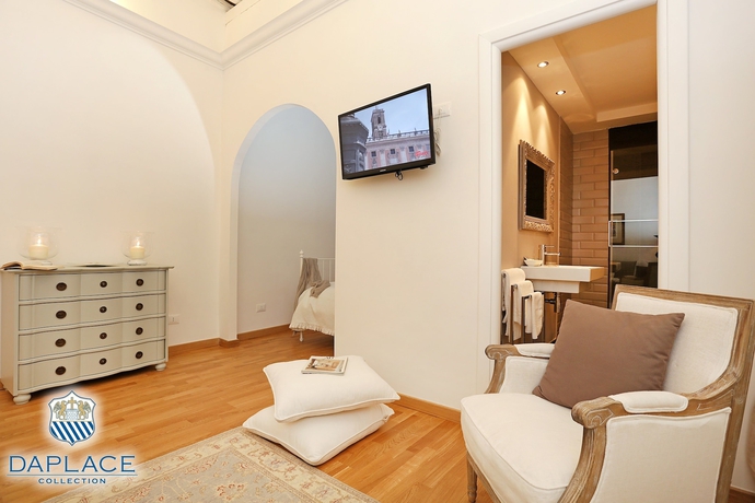 Imagen de la habitación del Hotel Madonna De’ Monti Suites. Foto 17