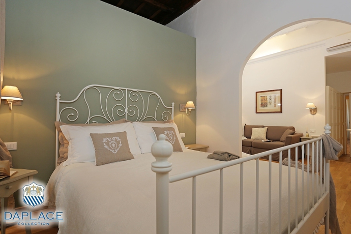 Imagen de la habitación del Hotel Madonna De’ Monti Suites. Foto 18