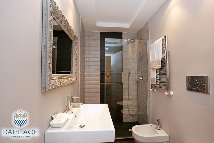 Imagen de la habitación del Hotel Madonna De’ Monti Suites. Foto 19