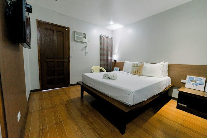 Imagen de la habitación del Hotel Madonna Hometel and Suites. Foto 19
