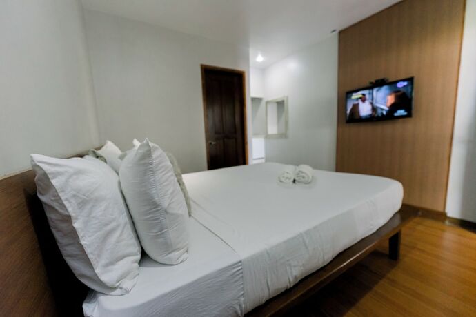 Imagen de la habitación del Hotel Madonna Hometel and Suites. Foto 20
