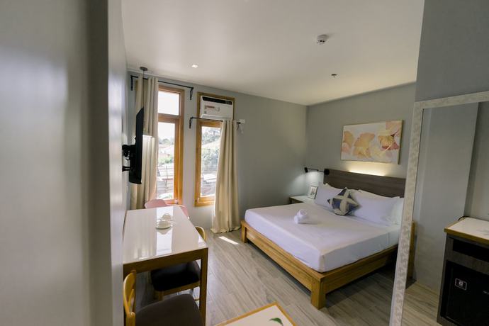 Imagen de la habitación del Hotel Madonna Hometel and Suites New Pandan. Foto 3