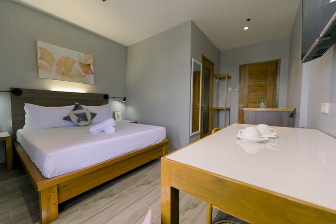 Imagen de la habitación del Hotel Madonna Hometel and Suites New Pandan. Foto 9