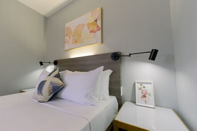 Imagen de la habitación del Hotel Madonna Hometel and Suites New Pandan. Foto 12