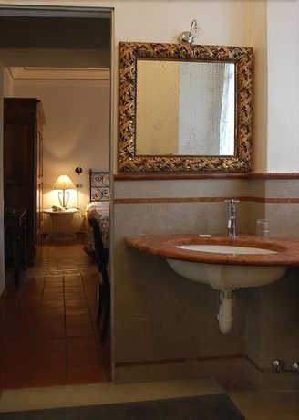 Imagen de la habitación del Hotel Madonnina Albergo Ristorante. Foto 14