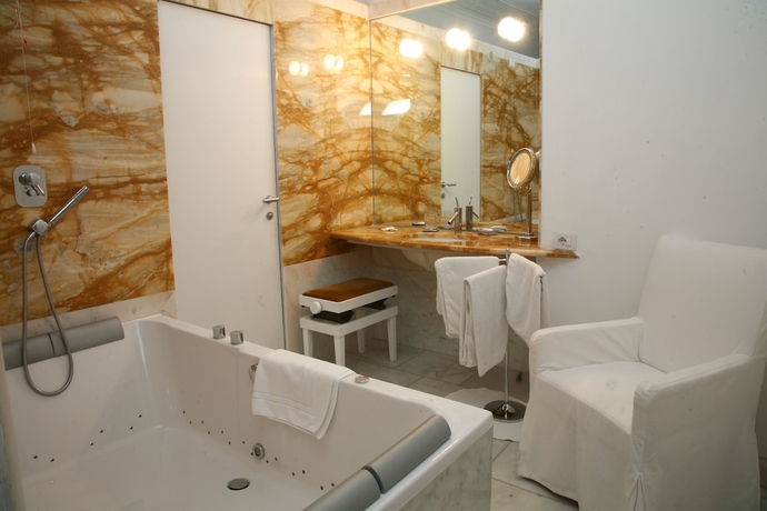 Imagen de la habitación del Hotel Madonnina Albergo Ristorante. Foto 15
