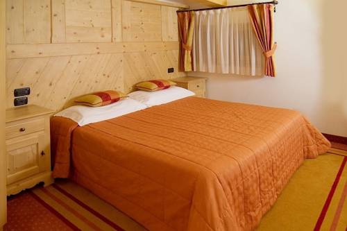 Imagen de la habitación del Hotel Madonnina Resort And Wellness. Foto 3