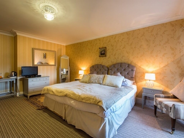 Imagen de la habitación del Hotel Maenan Abbey. Foto 18