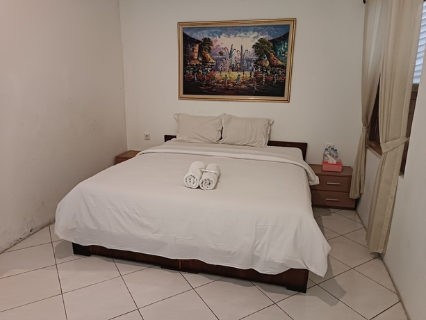 Imagen de la habitación del Hotel Maerakatja Yogyakarta. Foto 6