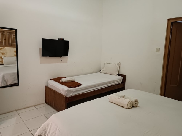 Imagen de la habitación del Hotel Maerakatja Yogyakarta. Foto 7