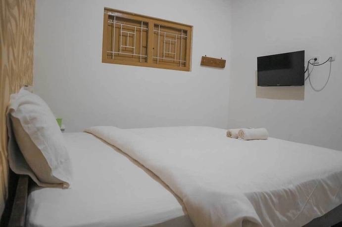 Imagen de la habitación del Hotel Maerakatja Yogyakarta. Foto 9