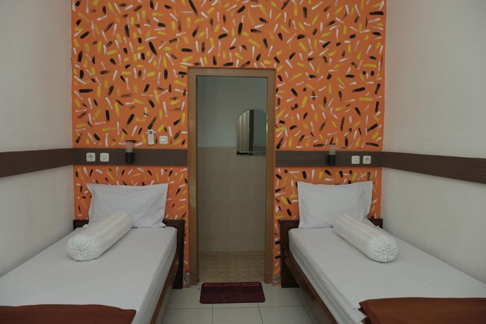 Imagen de la habitación del Hotel Maerakatja Yogyakarta. Foto 13