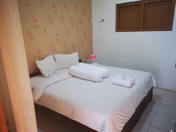 Imagen de la habitación del Hotel Maerakatja Yogyakarta. Foto 16