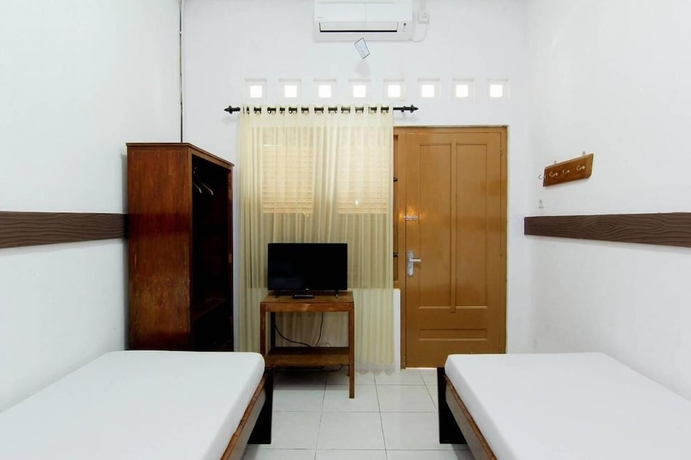 Imagen de la habitación del Hotel Maerakatja Yogyakarta. Foto 17