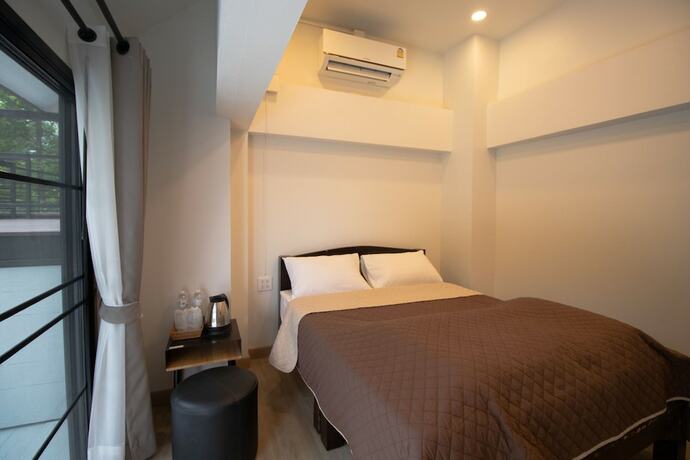 Imagen de la habitación del Hotel Maesa Greenery Hill. Foto 8