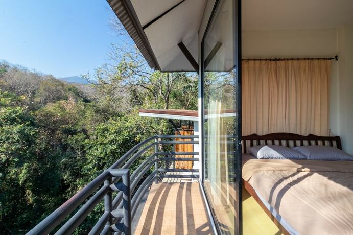 Imagen de la habitación del Hotel Maesa Greenery Hill. Foto 16