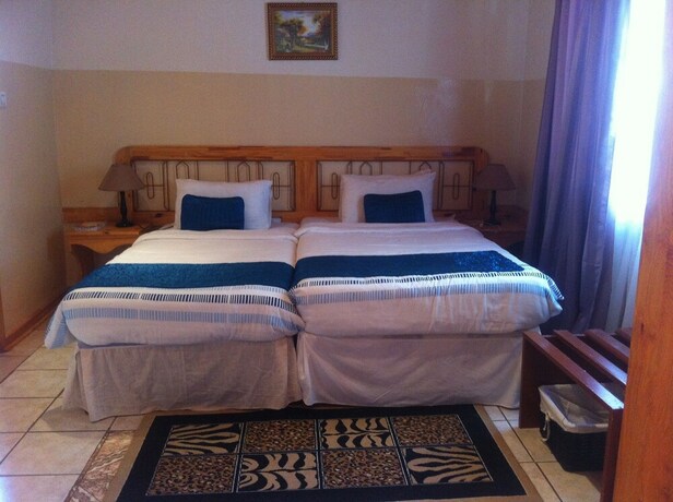 Imagen de la habitación del Hotel Maeto Lodge. Foto 19