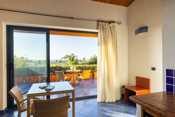 Imagen de la habitación del Hotel Magaggiari Resort. Foto 12