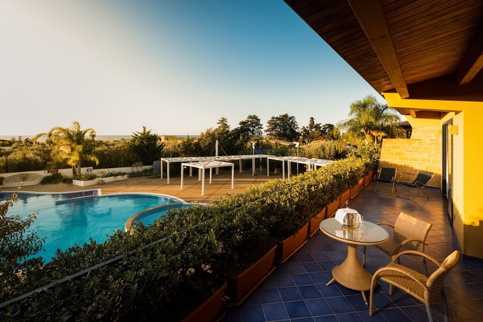 Imagen de la habitación del Hotel Magaggiari Resort. Foto 13