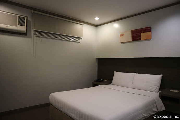 Imagen de la habitación del Hotel Magallanes Square. Foto 16