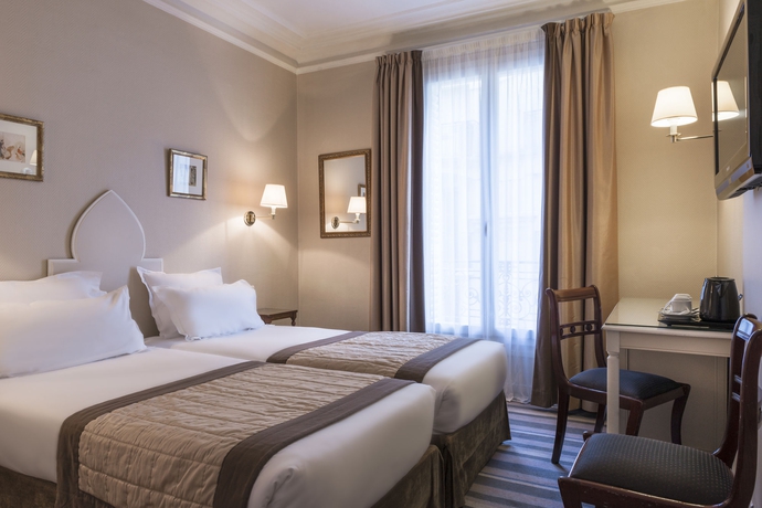 Imagen de la habitación del Hotel Magda Champs Elysées. Foto 7