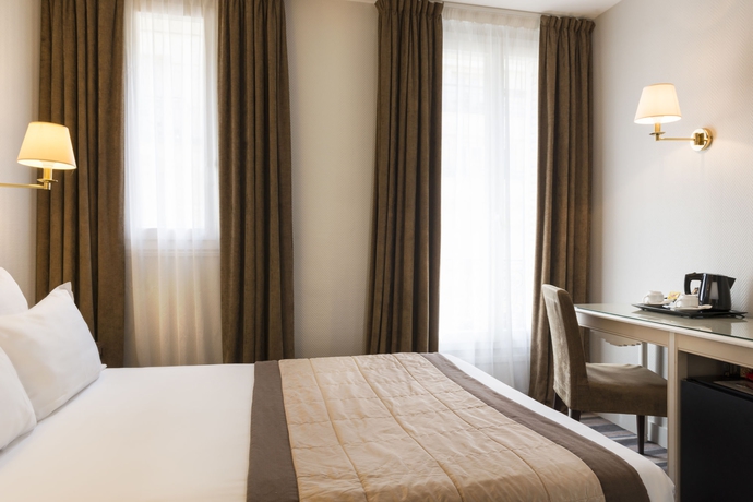 Imagen de la habitación del Hotel Magda Champs Elysées. Foto 8