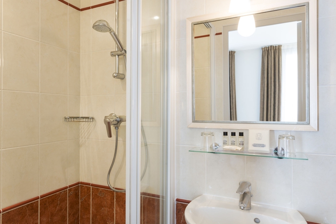 Imagen de la habitación del Hotel Magda Champs Elysées. Foto 12