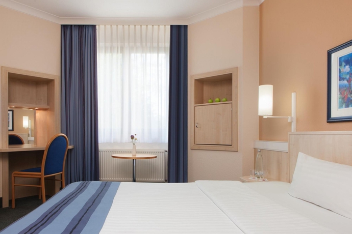 Imagen de la habitación del Hotel Magdeburg City Center by Leonardo. Foto 9