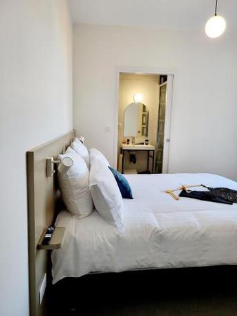 Imagen de la habitación del Hotel Mage h&ocirc;tels - H&ocirc;tel la grenette - Brasserie Bont&eacute; Divine. Foto 16