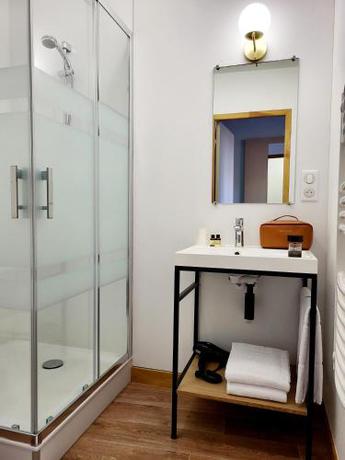 Imagen de la habitación del Hotel Mage h&ocirc;tels - H&ocirc;tel la grenette - Brasserie Bont&eacute; Divine. Foto 17
