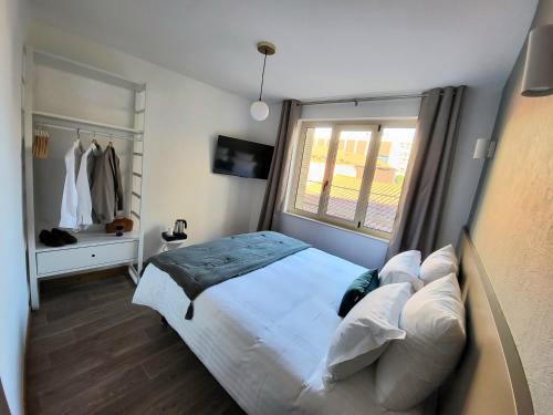 Imagen de la habitación del Hotel Mage h&ocirc;tels - H&ocirc;tel la grenette - Brasserie Bont&eacute; Divine. Foto 18