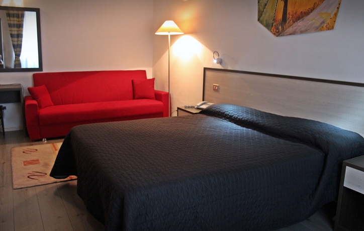 Imagen de la habitación del Hotel Magenta. Foto 12