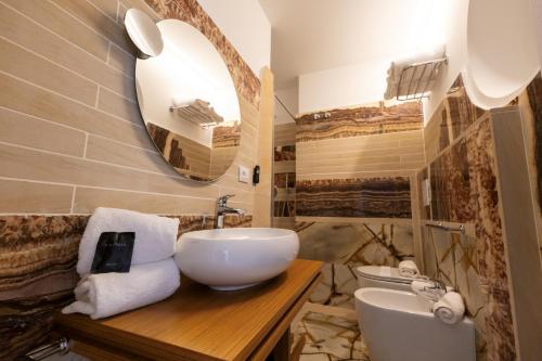 Imagen de la habitación del Hotel Maggiano Boutique. Foto 13