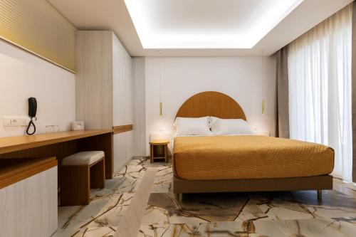 Imagen de la habitación del Hotel Maggiano Boutique. Foto 14