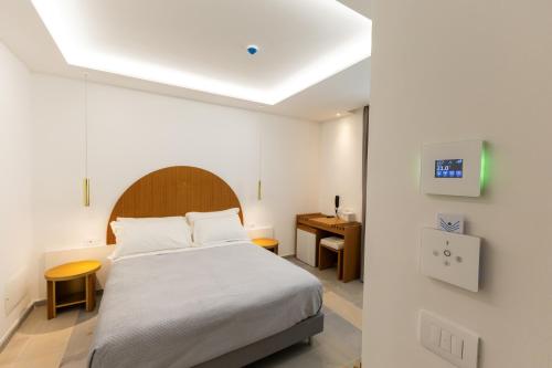 Imagen de la habitación del Hotel Maggiano Boutique. Foto 17