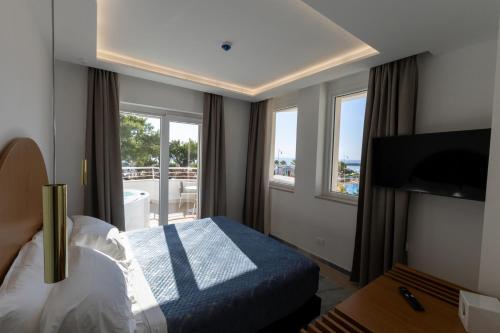 Imagen de la habitación del Hotel Maggiano Boutique. Foto 19