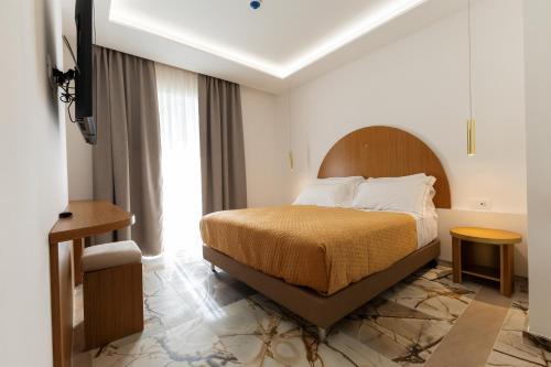 Imagen de la habitación del Hotel Maggiano Boutique. Foto 20