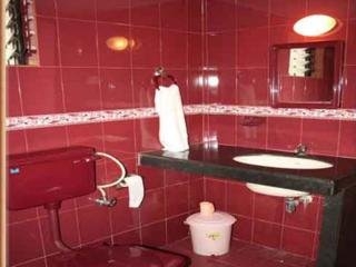 Imagen de la habitación del Hotel Maggies Guest House. Foto 3