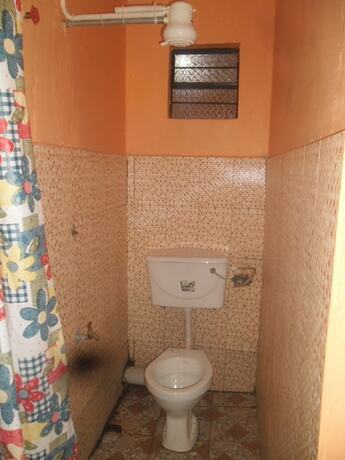 Imagen de la habitación del Hotel Magi Guest House. Foto 14