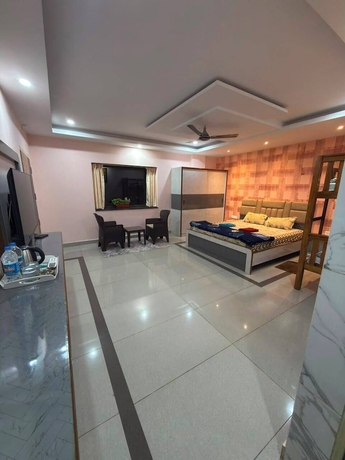 Imagen de la habitación del Hotel Magic Alpha Residency. Foto 5