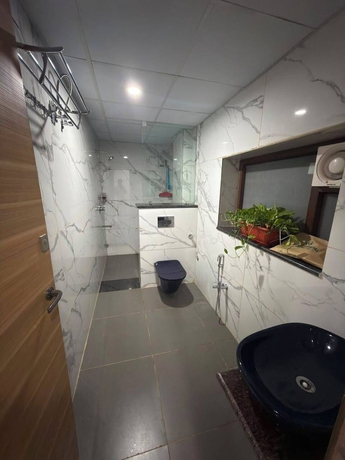 Imagen de la habitación del Hotel Magic Alpha Residency. Foto 12