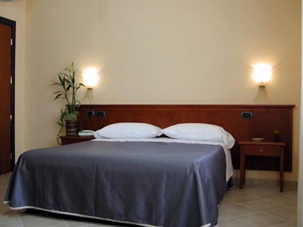 Imagen de la habitación del Hotel Magic, Atena Lucana Scalo. Foto 14