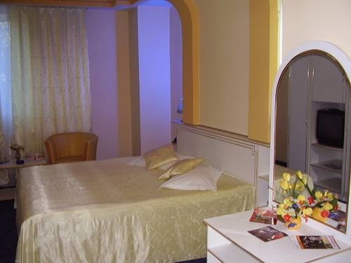 Imagen de la habitación del Hotel Magic City Center. Foto 2