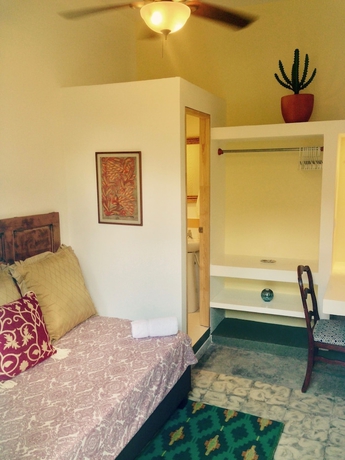 Imagen de la habitación del Hotel Magic Garden House. Foto 2