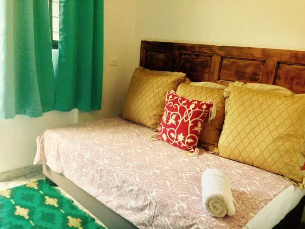 Imagen de la habitación del Hotel Magic Garden House. Foto 3