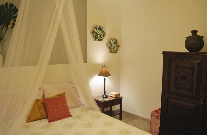 Imagen de la habitación del Hotel Magic Garden House. Foto 4