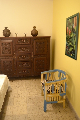 Imagen de la habitación del Hotel Magic Garden House. Foto 5