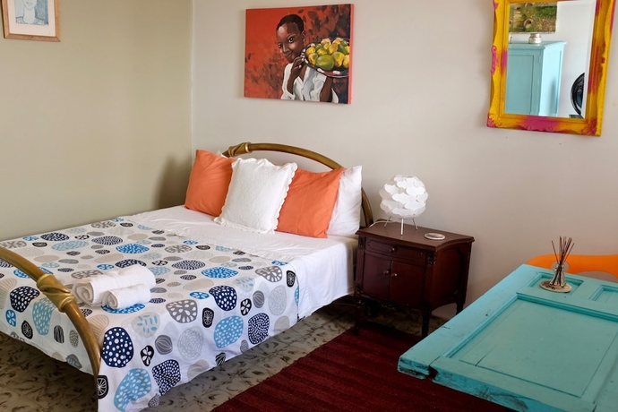 Imagen de la habitación del Hotel Magic Garden House. Foto 6