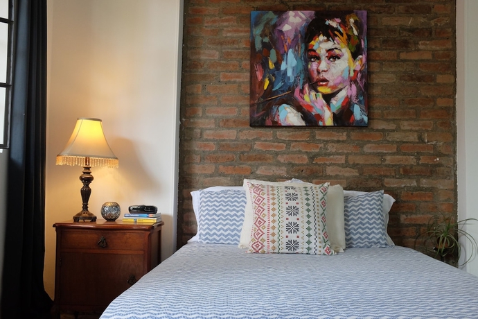 Imagen de la habitación del Hotel Magic Garden House. Foto 8