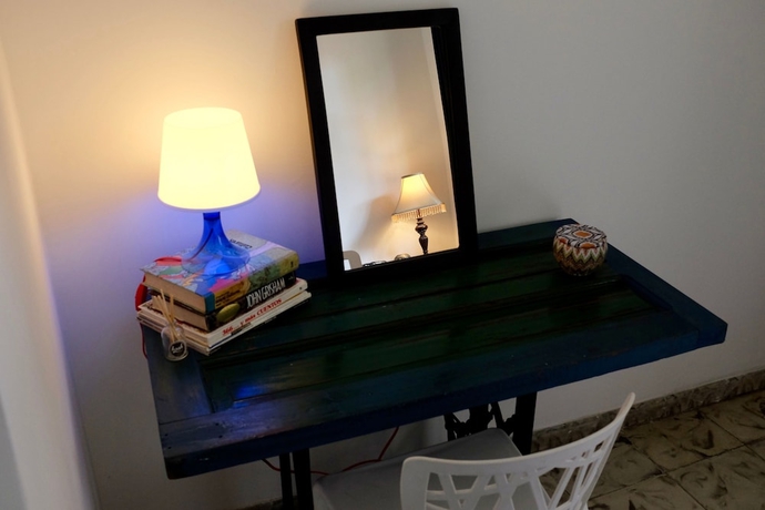 Imagen de la habitación del Hotel Magic Garden House. Foto 9